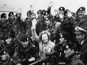 ‘Y’ company of the 1st Battalion the Royal Hampshire Regiment 'The Tigers' surround Prime Minister Margaret Thatcher and Chief of Naval Staff Admiral Sir John Fieldhouse at Goose Green, East Falkland