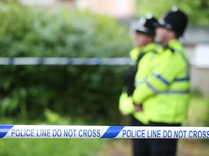 Police officers manning a cordon