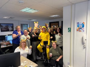 The team and a cardboard cut out Paddy McGuinness raised funds for charity  