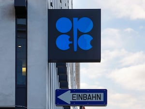 The logo of the Organization of the Petroleoum Exporting Countries (OPEC) is seen outside of OPEC’s headquarters in Vienna, Austria, March 3, 2022. A street sign that says 'one way' is positioned below the logo