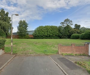 Green space on The Dell in Wollaston where Aldi want to extend their supermarket