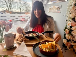 Sureena enjoys some food with Lorraine