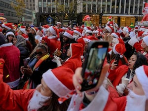 People dressed as Father Christmas