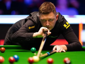 Kyren Wilson in action against Luca Brecel at the 2025 Masters at Alexandra Palace