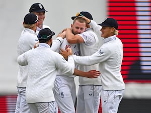 England’s Gus Atkinson, centre, celebrates a hat-trick