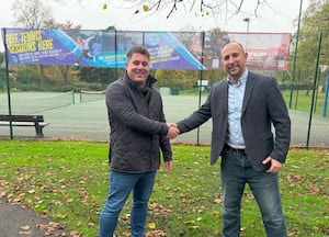 David Lloyd Lichfield general manager Andy Lightbown with Tennis For Free chief executive Paul Jessop outside the tennis courts at Beacon Park, Lichfield