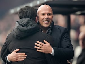 Liverpool manager Arne Slot (right) greets Bournemouth manager Andoni Iraola