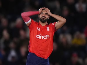 England bowler Saqib Mahmood puts his hands to his head after a near hat-trick against Australia.