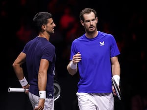 Novak Djokovic (left) and Andy Murray on court