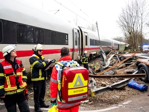 Emergency services at the scene of the accident at a level crossing in Hamburg, Germany