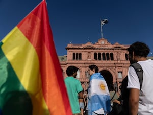 A rainbow flag at a protest in Buenos Aires