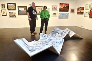 Steve is pictured with Kavita Kumari from the Gallery. The sculpture is by Ian Andrews.