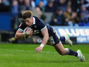 Huw Jones scores a try