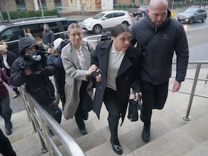 Chelsea and Australia striker Sam Kerr arrives wither partner Kristie Mewis at the court