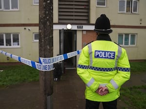 Police at the scene on Fownhope Close in Redditch, Worcestershire