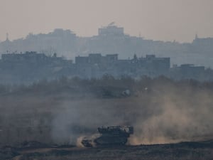 An Israel army vehicle on the move in Gaza