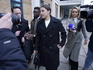 Chelsea striker Sam Kerr (centre) outside Kingston Crown Court, south-west London