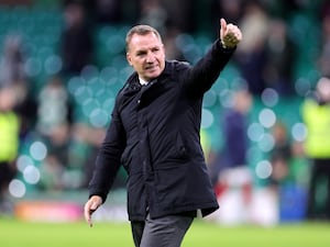 Brendan Rodgers gives the fans a thumbs up at Celtic Park