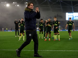 Thomas Frank applauds the fans