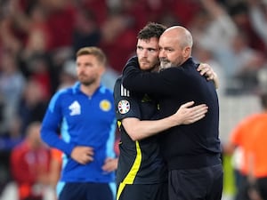 Steve Clarke and Andy Robertson embrace