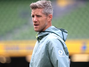 Interim Ireland head coach Simon Easterby looks around during training