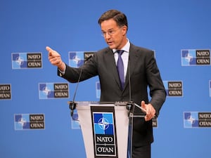 Nato Secretary General Mark Rutte points at the lectern