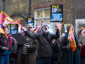 Members of the National Education Union hold a rally outside the Department for Education in London in November