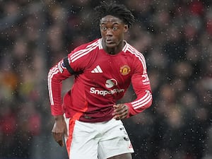 Kobbie Mainoo playing for Manchester United against Nottingham Forest