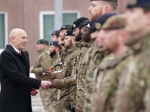 Defence Secretary John Healey giving out Wider Service Medals as he meets British personnel at the Tapa military base in Estonia (Stefan Rousseau/PA)