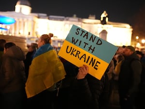 People gather in Trafalgar Square, central London, to mark the third anniversary of Russia’s invasion of Ukraine