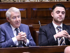 Independent TDs Michael Lowry and Barry Heneghan in the Dail chamber ahead of the vote on the nomination of Micheal Martin as Taoiseach