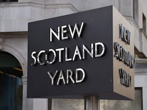 A close up of the sign outside New Scotland Yard