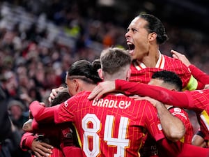 Liverpool’s Virgil van Dijk (top) celebrates