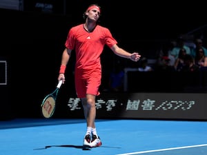 Stefanos Tsitsipas looks frustrated during his loss to Alex Michelsen