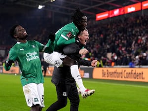 Kevin Nancekivell gives Darko Gyabi a piggy back after Plymouth's win over Brentford