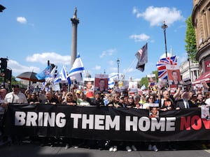 People at a rally calling for hostages to be released