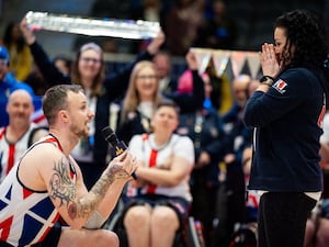 Man proposing to shocked woman