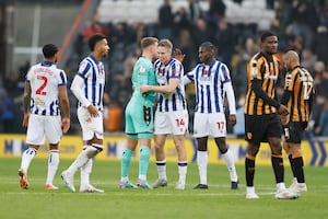 Torbjorn Heggem celebrates with his Baggies team-mates after the win at Hull. Pic: PA
