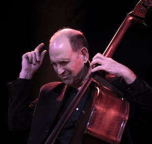 American-born bassist Tom Hill