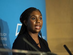 Kemi Badenoch speaking at a press conference