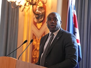 Foreign Secretary David Lammy speaking with the Union flag in the background