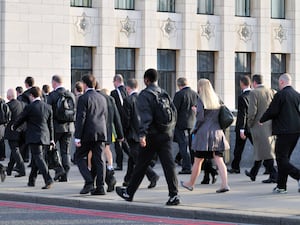 Morning rush hour commuters walking in London