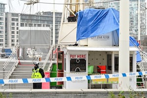 Police at the cordoned off Star Flyer ride in Centenary Square, Birmingham, on Friday morning, December 13, 2024.   =