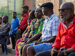 People line up before the opening of the polling stations