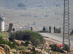 Zoomed in photo showing soldiers at a checkpoint