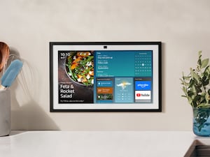 An Amazon Echo Show device on a wall