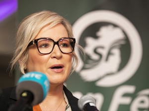 Michelle O’Neill speaking into a microphone