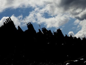 A silhouette of houses