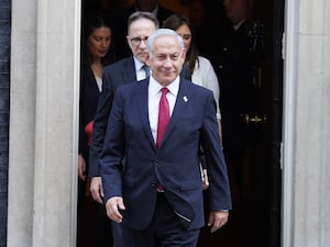 Israeli Prime Minister Benjamin Netanyahu walks out of 10 Downing Street