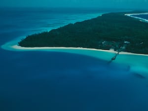 Aerial picture showing roads, buildings and forest on Diego Garcia Islands in the Indian Ocean